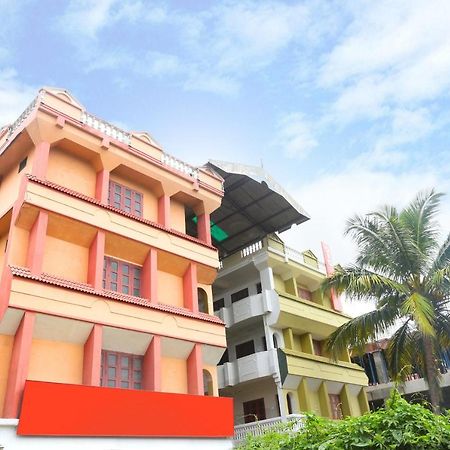 Oyo Flagship Kaveri Tourist Home Гуруваюр Экстерьер фото